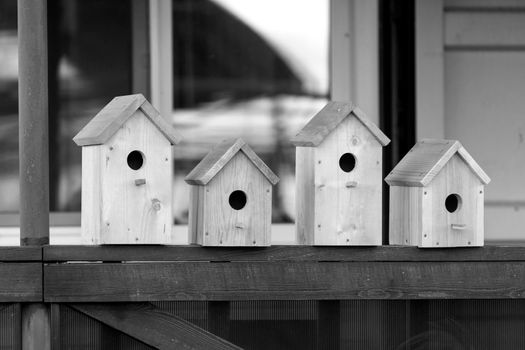 Four wooden birdhouses on sale