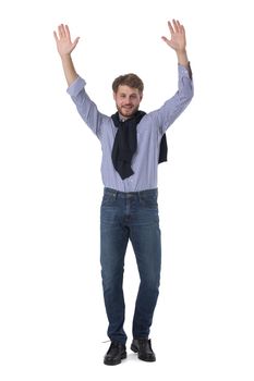 Full length portrait of young business man in casual clothes standing with raised arms isolated on white background