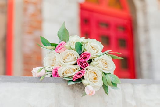 the bride's bouquet lies on a beautiful background. photo