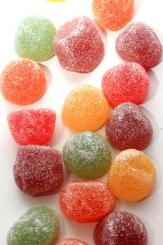 Sugared fruit candy in different shapes, colors and sizes