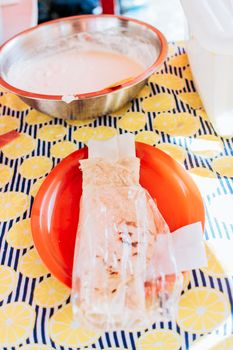 Traditional Nicaraguan Quesillo, food Traditional Large Quesillo served on table. Nicaraguan cheese made and served on the table. Traditional cheese with pickled onion and wrapped tortilla.