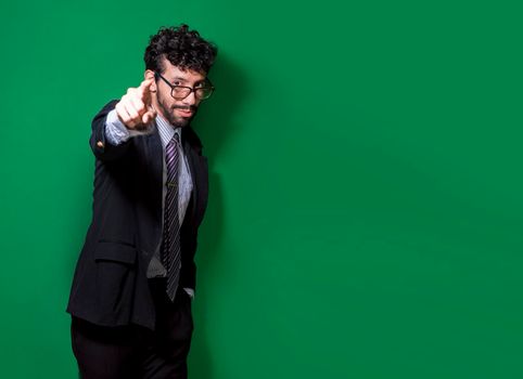 Friendly smiling business man pointing at you, Positive business people pointing at camera. Young businessman with positive attitude pointing at me