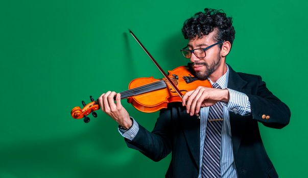 Handsome man in formal suit playing violin isolated, Close up of a music teacher playing his violin isolated, Person in suit playing violin on isolated background