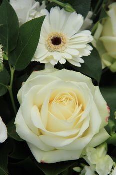 Single white rose in a wedding bouquet, bridal flowers