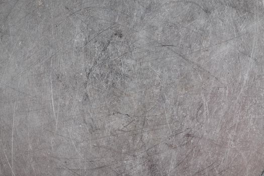 scratched real life old aluminuim flat sheet texture and full frame background.