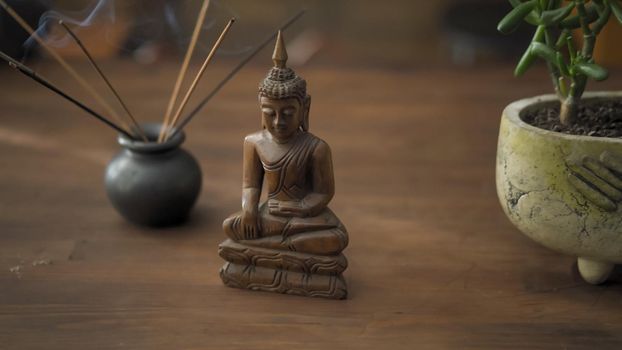 Buddha Figurine And Incense Bowl With Sticks, Decoration On Work Place Desk In Days Of Quarantine, Spiritual Cleansing Of Room Before Work