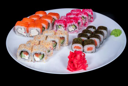 Japanese Cuisine - Sushi Roll with Shrimps and Conger, Avocado, Tobiko and Cheese. sushi rolls tempura,japanese food style