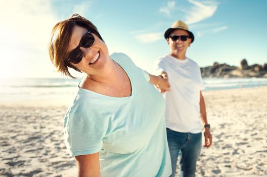 Theres nothing like a day at the beach. a mature couple spending the day at the beach