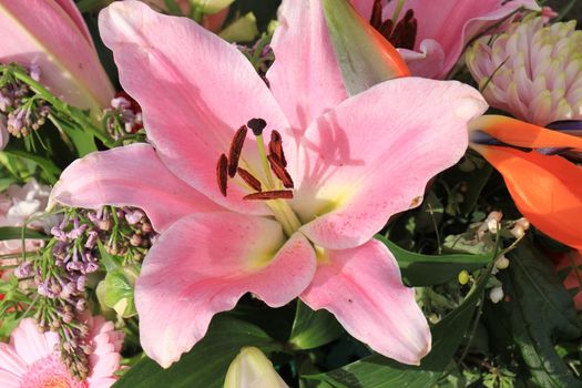 Big pink lilies in a floral wedding decoration