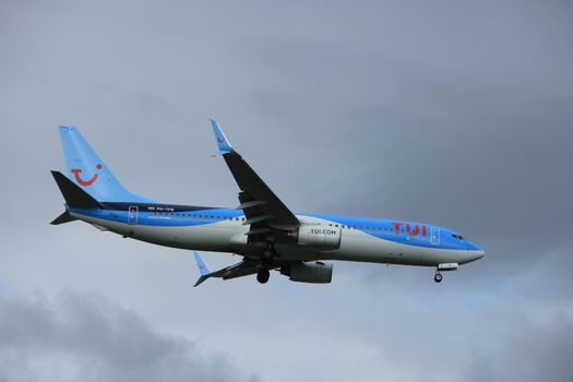 Amsterdam the Netherlands - July 20th 2017: PH-TFB TUI Airlines Netherlands Boeing 737-800 approaching Schiphol Amsterdam Airport Polderbaan runway