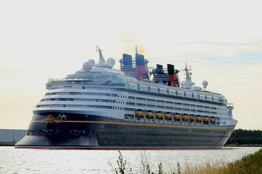 Velsen, the Netherlands - June, 27th 2017: Disney Magic on North Sea Canal, sailing towards Amsterdam Cruise terminal