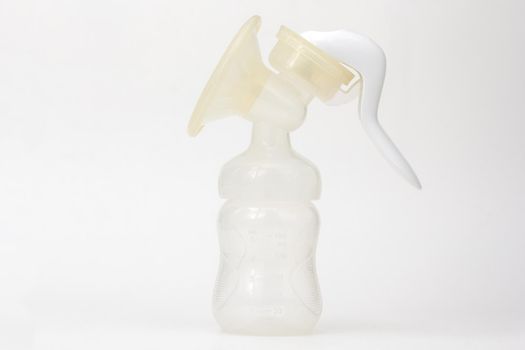 Isolated empty manual breast pump on white background