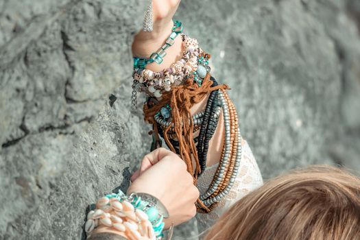 fashionable young model in boho style dress