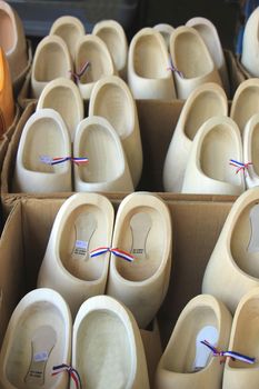 Dutch wooden clogs at a market stall, traditional shoes