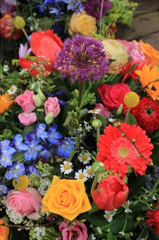 Mixed flower arrangement: various flowers in different colors for a wedding