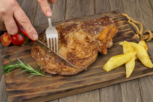 Veal cutlet from Avila, Spain with potatoes and vegetables juicy and tender