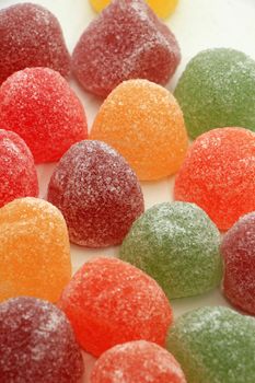 Sugared fruit candy in different shapes, colors and sizes