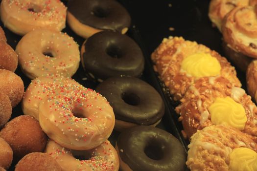 Fresh confectionery, puff pastry with fruit and doughnuts