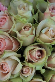 Pink roses in a mixed bridal bouquet