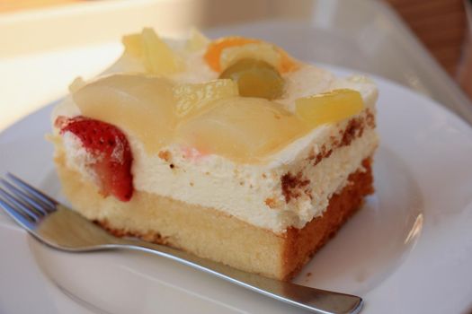 Fresh made confectionery, cheese cake with fruit