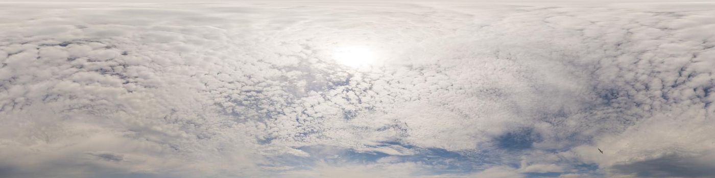 Blue sky with Cumulus clouds Seamless panorama in spherical equirectangular format. Complete zenith for use in 3D graphics, game and for composites in aerial drone 360 degree panoramas as a sky dome.