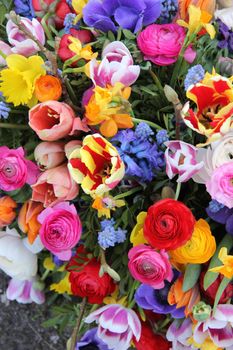 Colorful mixed bouquet with various spring flowers