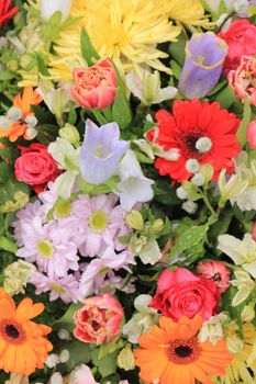 Multi colored wedding flowers in a decorative arrangement