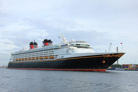 Velsen, the Netherlands - June, 27th 2017: Disney Magic on North Sea Canal, sailing towards Amsterdam Cruise terminal