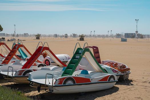 catamarans with an entertaining slide on the beach. Italy