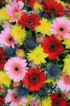 Mixed flower arrangement: various flowers in different colors for a wedding