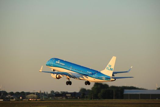 Amsterdam, the Netherlands  -  June 2nd, 2017: PH-EZB KLM Cityhopper Embraer ERJ-190STD taking off from Polderbaan Runway Amsterdam Airport Schiphol