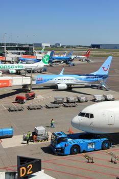 Amsterdam The Netherlands -  May 26th 2017: Aircrafts of various airlines parked at Amsterdam Schiphol International Airport