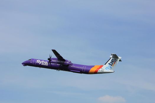 Amsterdam, the Netherlands  -  June 2nd, 2017: G-JEDP Flybe De Havilland Canada DHC-8-402Q Dash 8 taking off from Polderbaan Runway Amsterdam Airport Schiphol