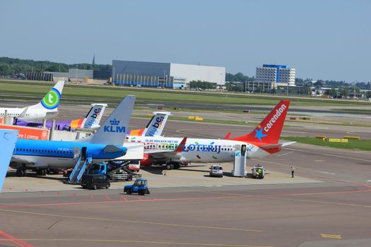 Amsterdam The Netherlands -  May 26th 2017: various airlines parked at gate at Schiphol International Airport