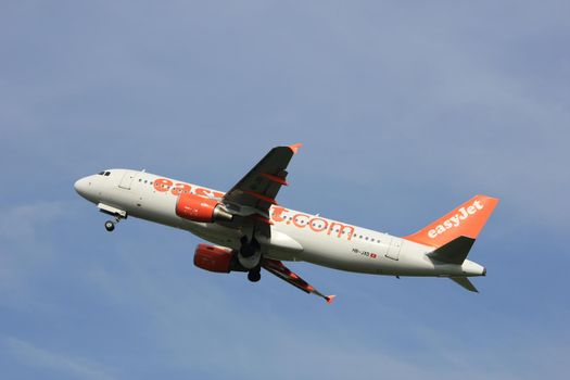 Amsterdam, the Netherlands  -  June 2nd, 2017: HB-JXD easyJet Switzerland Airbus A320 taking off from Polderbaan Runway Amsterdam Airport Schiphol