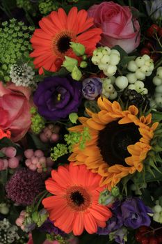 Mixed flower arrangement: various flowers in different colors for a wedding