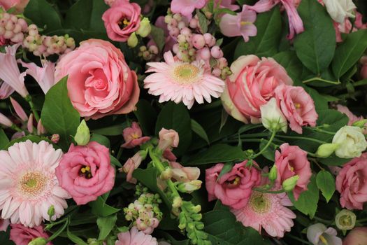 Mixed pink flower arrangement: various flowers in different shades of pink