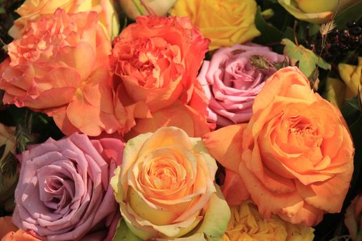 Multicolored roses in a floral wedding decoration