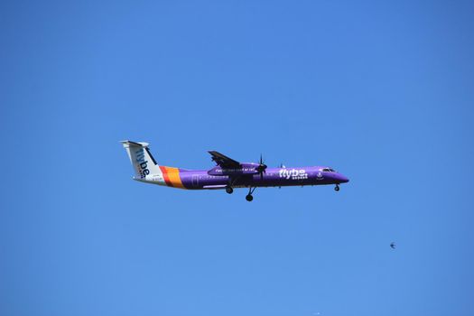 Amsterdam the Netherlands - July 9th 2017: G-ECOH Flybe De Havilland  approaching Schiphol Amsterdam Airport Kaagbaan runway