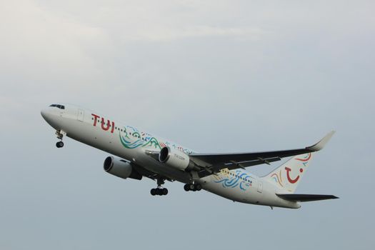 Amsterdam the Netherlands - July 6th, 2017:HB-JJF TUI Airlines Netherlands Boeing 767-300 takeoff from Polderbaan runway, Amsterdam Schiphol Airport