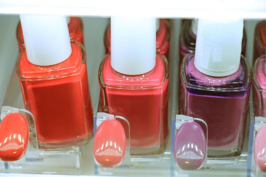 Nailpolish display in a store showing all various colors