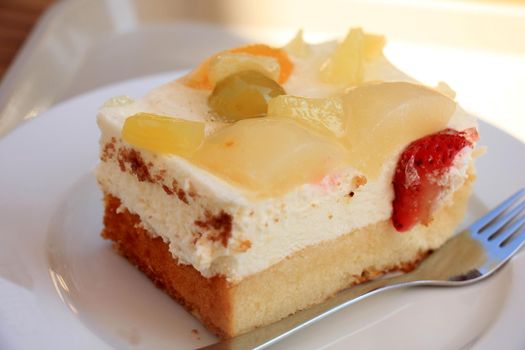 Fresh made confectionery, cheese cake with fruit