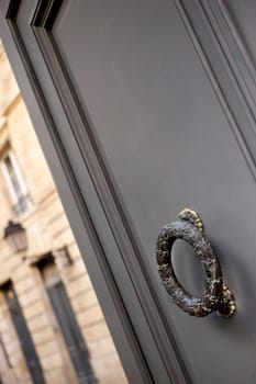 Door of a French mansion and knocker