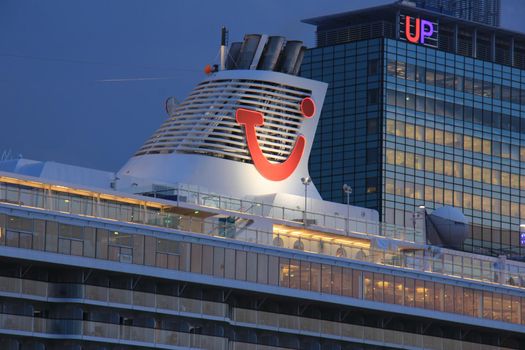 Amsterdam, The Netherlands - May 11th 2017: Mein Schiff 3 TUI Cruises docked at Passenger Terminal Amsterdam, funnel with logo