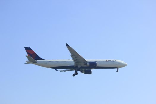 Amsterdam, the Netherlands - April 9th, 2017: N826NW Delta Air Lines Airbus A330 approaching Polderbaan runway at Schiphol Amsterdam Airport, the Netherlands