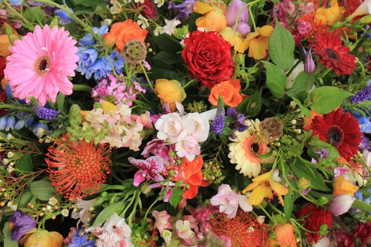 Multi colored wedding flowers in a decorative arrangement