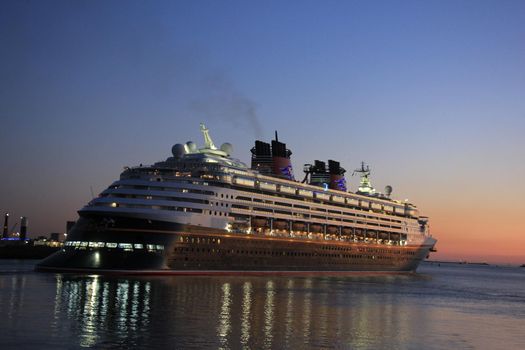 IJmuiden, the Netherlands - May, 25th 2017: Disney Magic leaving North Sea lock, IJmuiden.