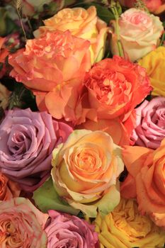 Multicolored roses in a floral wedding decoration