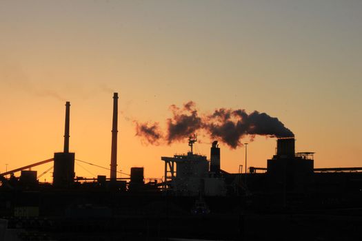 Skyline of an industrial area during sunset