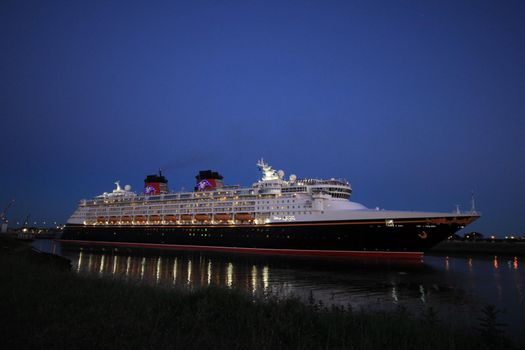 IJmuiden, the Netherlands - May, 25th 2017: Disney Magic leaving North Sea lock, IJmuiden.